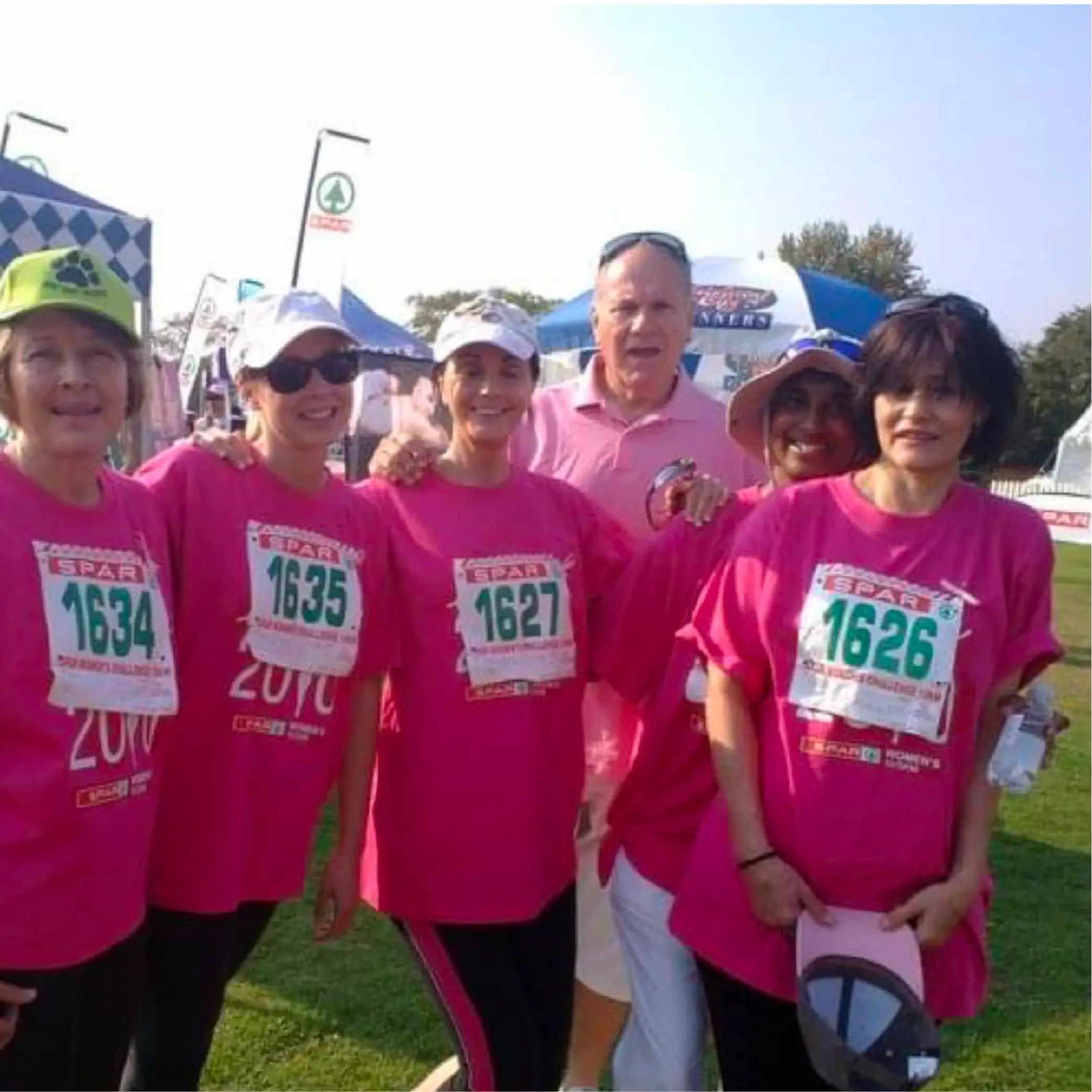 Participants enjoying a community running event together. Participants enjoying a community running event together.